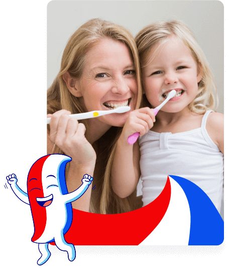 Mother and daughter brushing their teeth