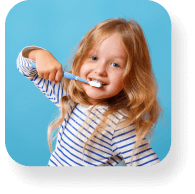 A little girl enjoying brushing her teeth.